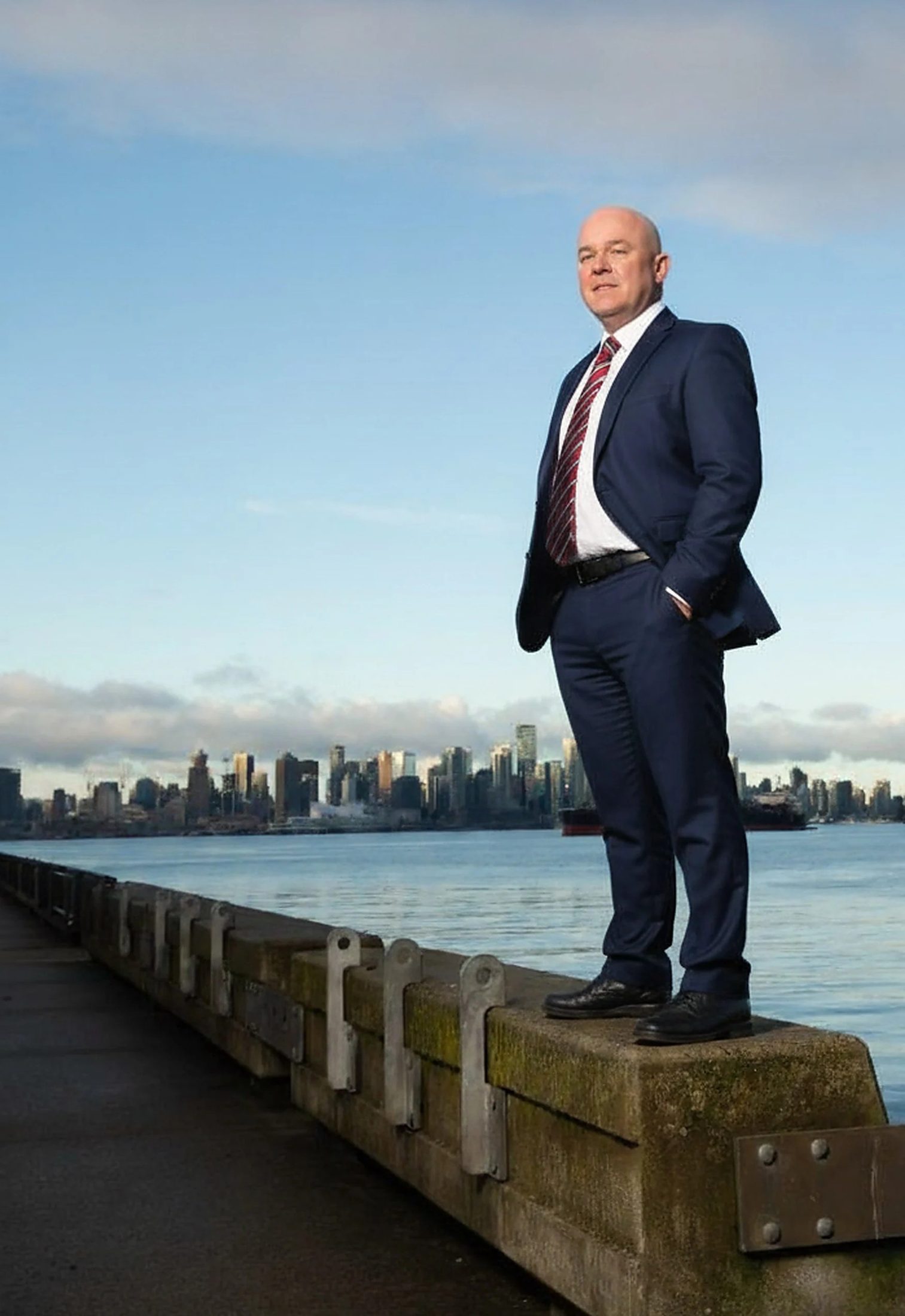 Rick Colbourne on the North Shore with the Vancouver skyline behind